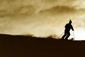 Skier,On,A,Slope,At,Sunset